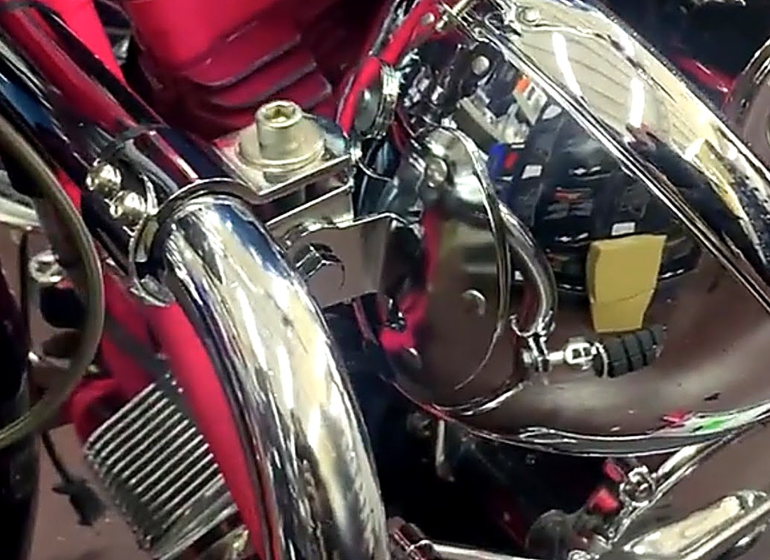 Chrome and wiring detail on a custom bagger build